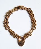 A gold gate-link bracelet marked 9ct, approx. 11.