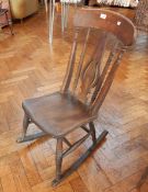 A stained rocking chair and another chair (2)