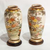 A pair of Japanese Kutani earthenware vases,