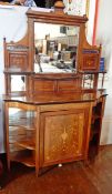 A rosewood inlaid chiffoniere with mirror back, with central cupboard,