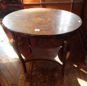 Edwardian inlaid occasional table, oval with instruments inlaid to the top, undershelf below,