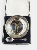 A George V silver dish with trifid topped spoon, London 1919, cased, diameter 17cm, 10oz approx.