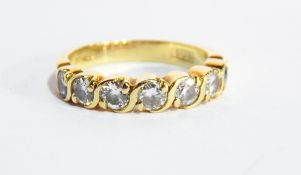 A 18ct gold and diamond seven stone dress ring/eternity ring,