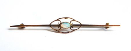 A gold bar brooch set with central oval opal, marked 9ct,