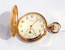 Bensons 9ct gold hunter pocket watch with engine-turned decoration and blind circular cartouche,