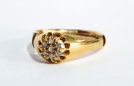 A 18ct gold and diamond dress ring, cluster design in pierced setting,