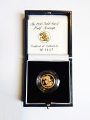 A 1998 gold proof half-sovereign,