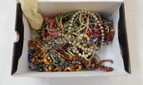 A quantity of bead necklaces and other costume jewellery
