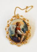 A porcelain plaque brooch painted with figure of a boy, in a gold mount,