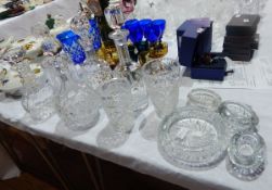 Quantity of cut glassware to include decanters, ashtrays, vases, etc.