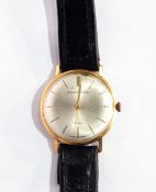 Germinal Voltaire gent's 14K gold wristwatch having silvered dial with gold batons