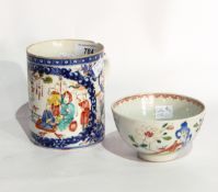 An antique Chinese porcelain mug, cylindrical and painted with figures in interior,