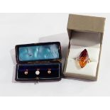 An opal set gold-coloured metal stud, two plain 9ct gold studs,
