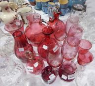 Quantity of cranberry glass jugs,