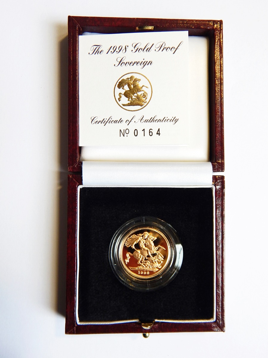 A 1998 gold proof sovereign,