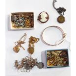A quantity of gold earrings, silver charm bracelet,