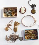 A quantity of gold earrings, silver charm bracelet,