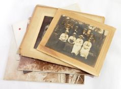A quantity of old photographs, buttons,