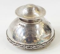 Omar Ramsden silver inkwell with flared body, raised thistle band, hinged top, London 1923,