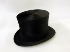 A black top hat by Scott & Co, Old Bond Street,