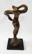 Resin sculpture of a figure dancing,