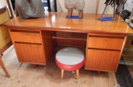 Heals 1950's teak kneehole desk with four flanking drawers,