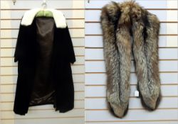 A black velvet evening coat with a white mink collar and a long fox stole (2)