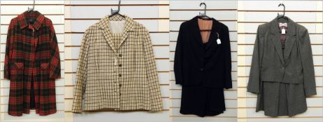 A vintage red, green and black check swing coat, a tweed suit, a vintage jacket and skirt,