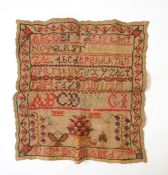 A sampler named and dated, "Eliz Th Dixon, aged 7,