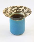 Stoneware vase with brown geometric patterned flared rim with powder blue body, marked "AR",