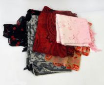A quantity of assorted shawls, scarves, etc.