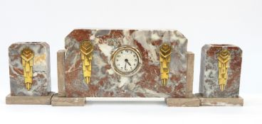 Art Deco style clock garniture in marble case with brass applied wedge-pattern and two brass Art