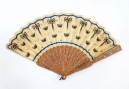 A Chinese wooden brise fan, both guard sticks slightly damaged,