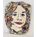 Studio pottery lustre plaque painted with the face of a woman with irises in her hair,