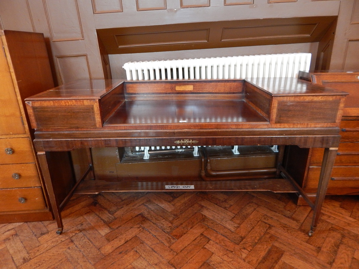 A mahogany dressing table converted from a spinet, two drawers, undershelf,