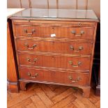 A Georgian style mahogany bachelors chest with brushing slide, four long graduated drawers,