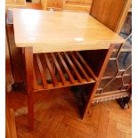 A walnut rectangular top side table, with open rack shelf below, on square legs,