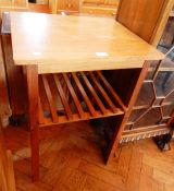 A walnut rectangular top side table, with open rack shelf below, on square legs,