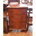 Reproduction mahogany serpentine front chest of four drawers, raised on bracket feet,