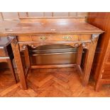 An old oak rectangular topped side table with moulded edge and frieze drawer,