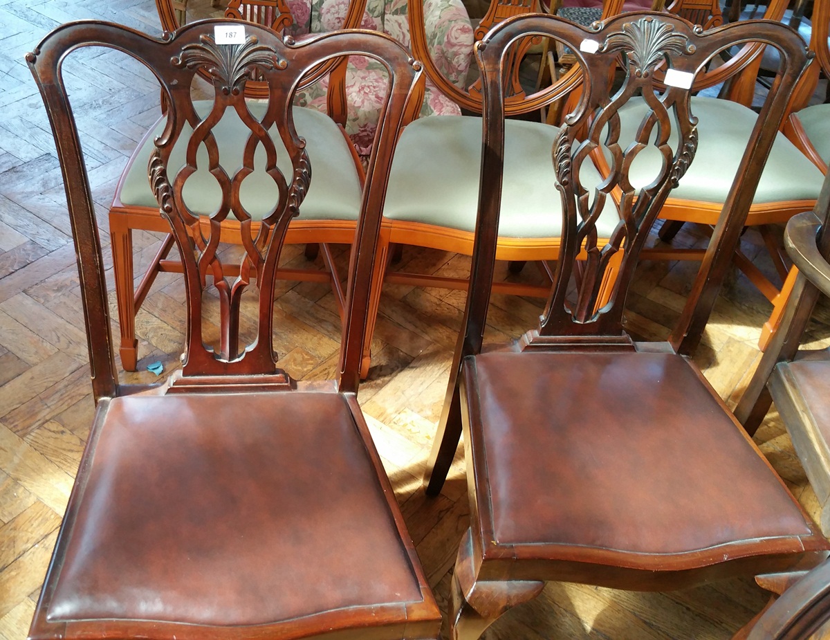 Six late 19th/early 20th century reproduction mahogany Georgian style dining chairs with carved and