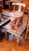 An Indian rectangular top coffee table, with turned legs with ironwork brackets, width 35cm,