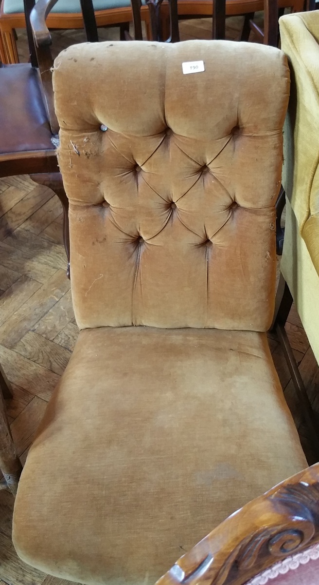 A late 19th century button upholstered lady's chair (in need of restoration)