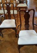 A set of ten Queen Anne style dining chairs (four standards and one carver) on cabriole legs with