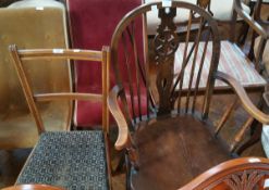 A modern wheelback Windsor style elbow chair and an Edwardian beech framed bedroom chair