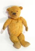 A small old gold plush bodied teddy,