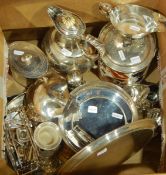 A collection of silver plate including a Victorian engraved hot water pot,
