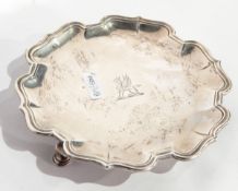 A George II silver card tray by John Edward II, London 1730 of shaped circular form,