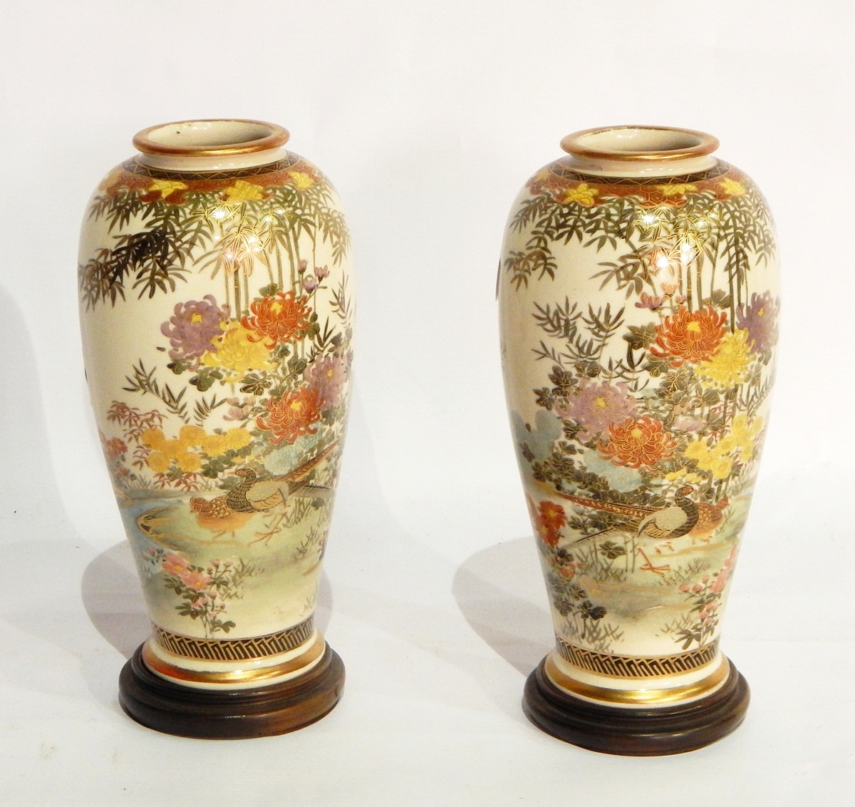 A pair of Japanese Kutani earthenware vases,