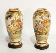 A pair of Japanese Kutani earthenware vases,